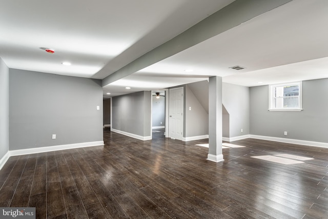 basement with dark wood-type flooring