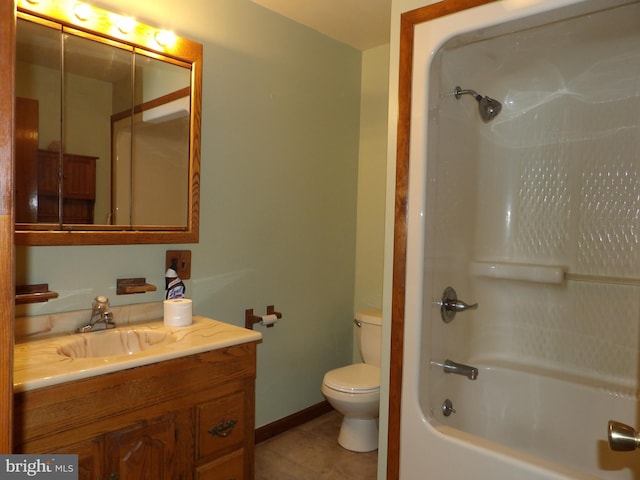 full bathroom featuring vanity, toilet, tile patterned flooring, and shower / bathtub combination