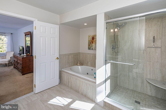 bathroom featuring separate shower and tub and tile patterned floors