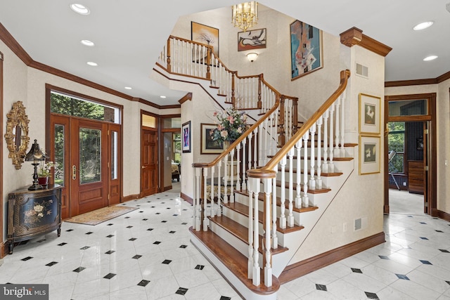 entryway featuring crown molding, stairway, visible vents, baseboards, and recessed lighting