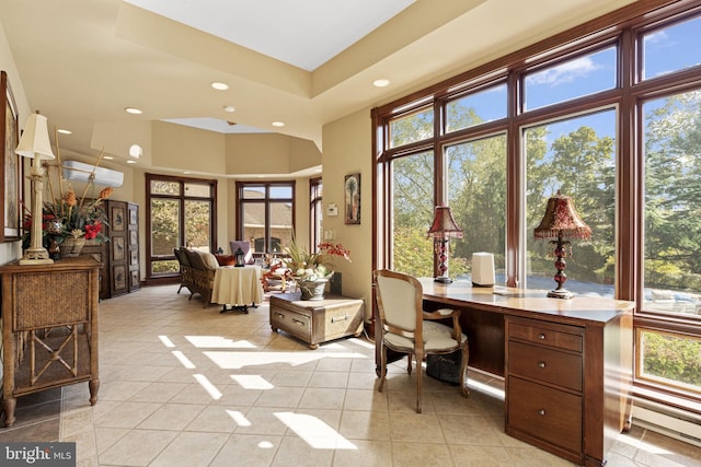 office space with a wealth of natural light, recessed lighting, light tile patterned floors, and a baseboard heating unit