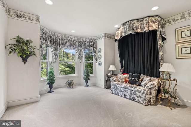 sitting room with recessed lighting, carpet flooring, and baseboards