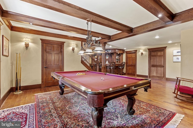 recreation room with pool table, beamed ceiling, and light wood-type flooring