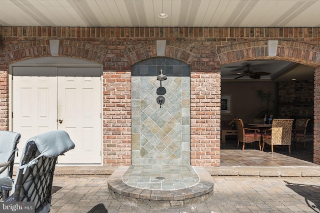 view of patio with ceiling fan