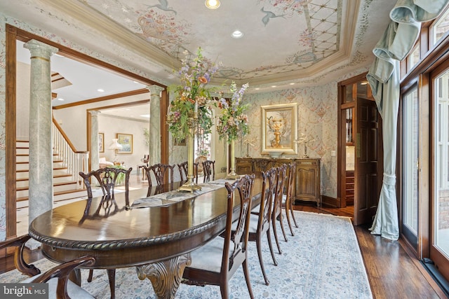 dining area with decorative columns, crown molding, dark hardwood / wood-style floors, and plenty of natural light