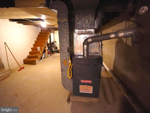 basement featuring heating unit