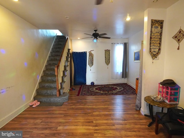 entryway featuring dark hardwood / wood-style floors and ceiling fan