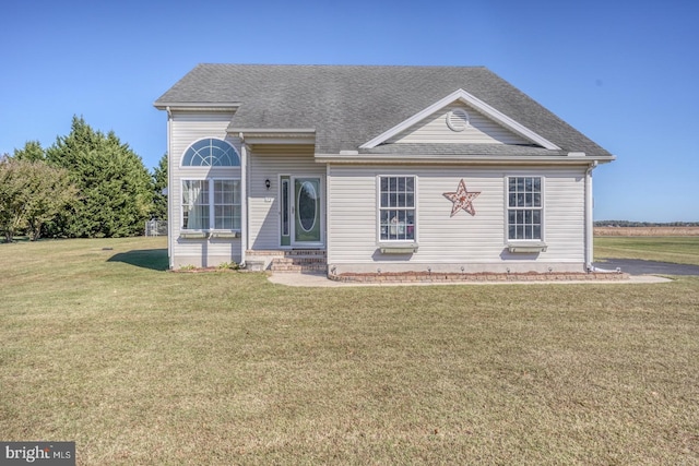 view of front of home with a front lawn