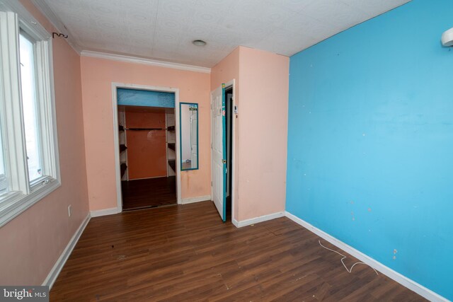 1019 Green Ln, Levittown, PA 19057 - empty room featuring baseboards, ornamental molding, and wood finished floors