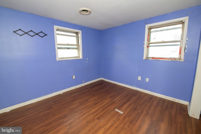 1019 Green Ln, Levittown, PA 19057 - unfurnished room featuring baseboards and wood finished floors