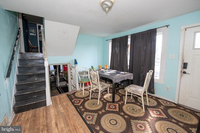 dining room with wood-type flooring