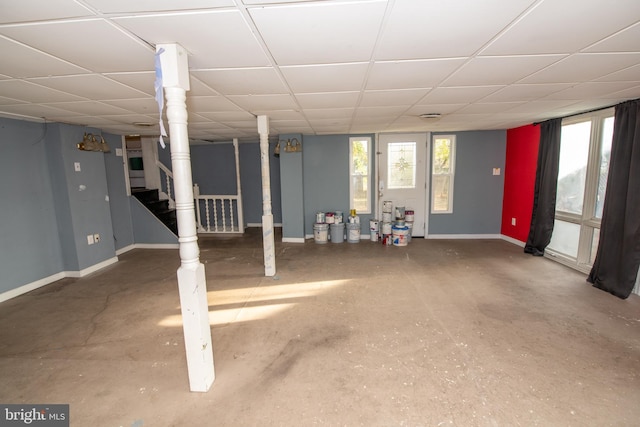 1019 Green Ln, Levittown, PA 19057 - basement with stairway, baseboards, and a drop ceiling