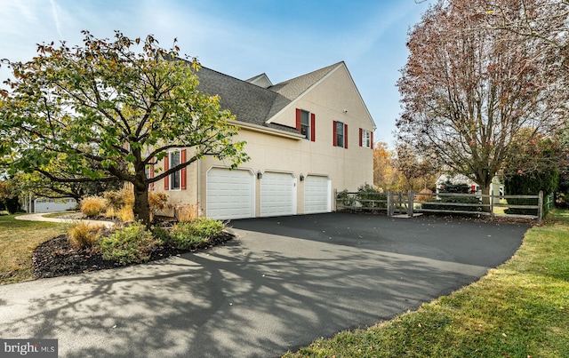 view of home's exterior with a garage