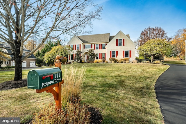 view of front of home with a front lawn