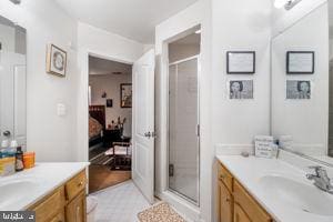 bathroom with vanity and walk in shower