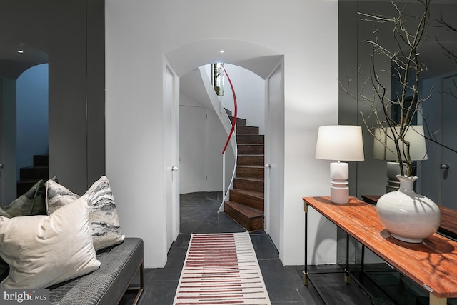 interior space featuring dark tile patterned floors