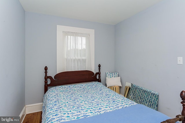 bedroom featuring wood-type flooring