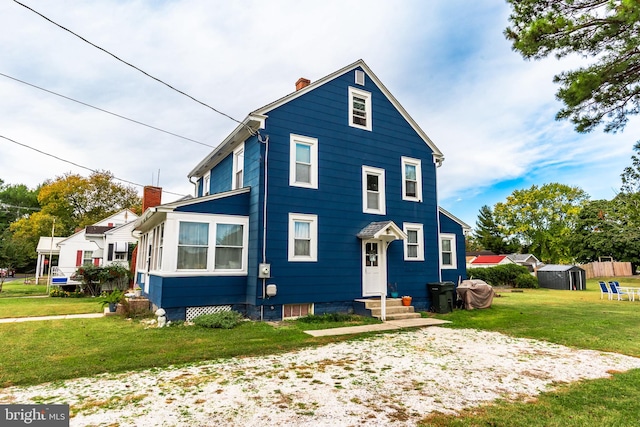 view of front facade with a front yard