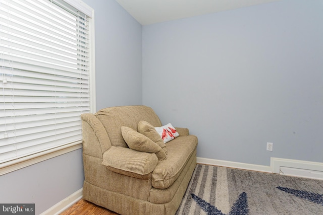 sitting room with hardwood / wood-style floors