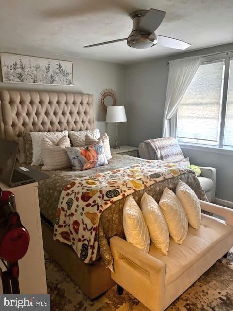 bedroom featuring ceiling fan