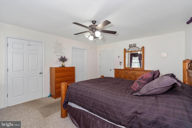 bedroom featuring ceiling fan and carpet flooring