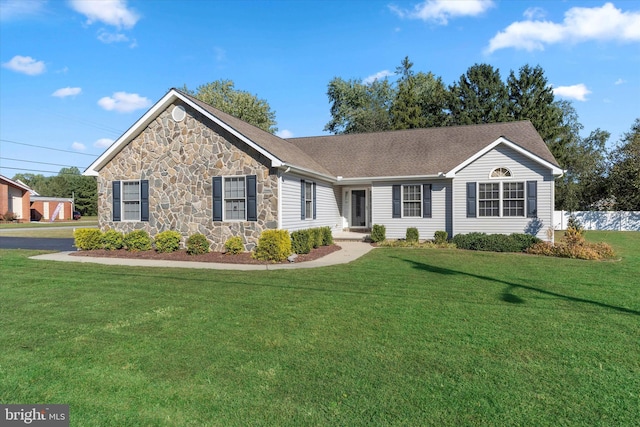 ranch-style house with a front yard