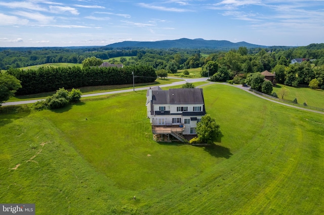 birds eye view of property featuring a mountain view