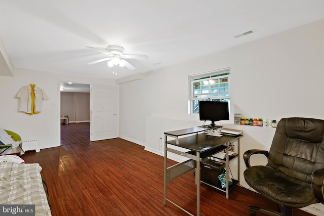 office featuring dark wood-type flooring and ceiling fan