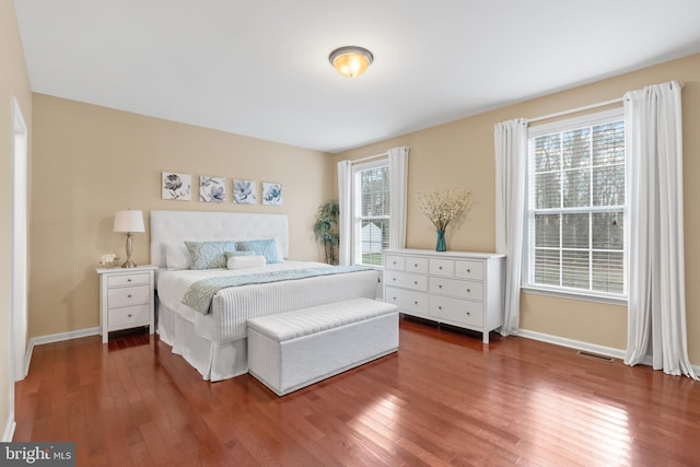 bedroom featuring dark hardwood / wood-style floors