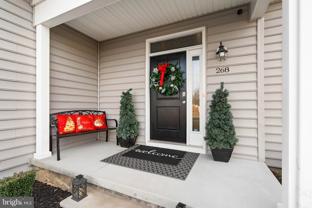 entrance to property with covered porch