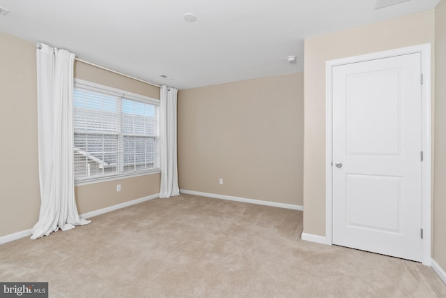 view of carpeted spare room