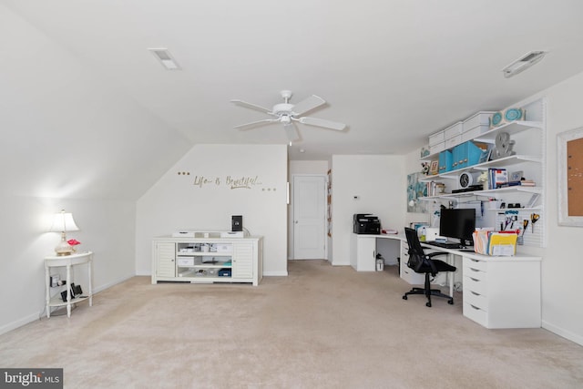 carpeted office space featuring ceiling fan and lofted ceiling