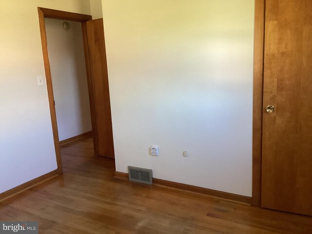 17604 Woodlawn Dr, Hagerstown, MD 21740 - interior space featuring visible vents, wood finished floors, and baseboards