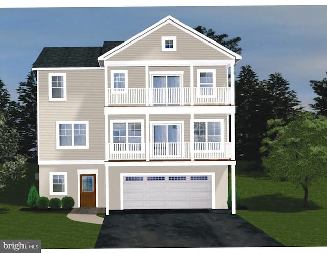 127 Shore Rd, Arnold, MD 21012 - view of front of house featuring a balcony, asphalt driveway, an attached garage, and a front yard