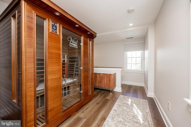 view of sauna / steam room with hardwood / wood-style floors