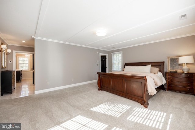 unfurnished bedroom featuring ornamental molding and light colored carpet