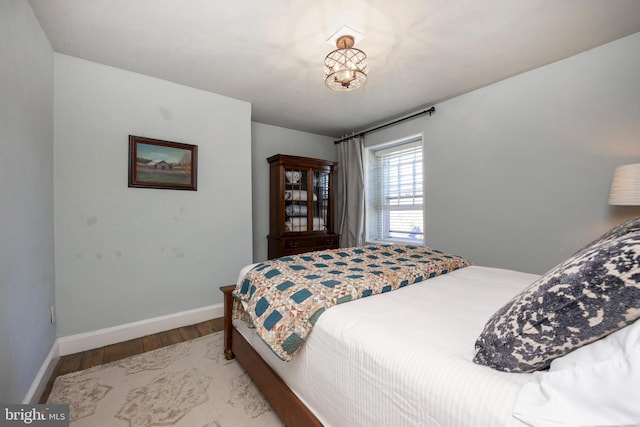 bedroom featuring hardwood / wood-style floors