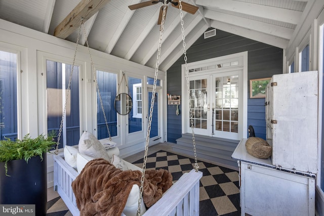 sunroom featuring french doors, ceiling fan, and lofted ceiling with beams