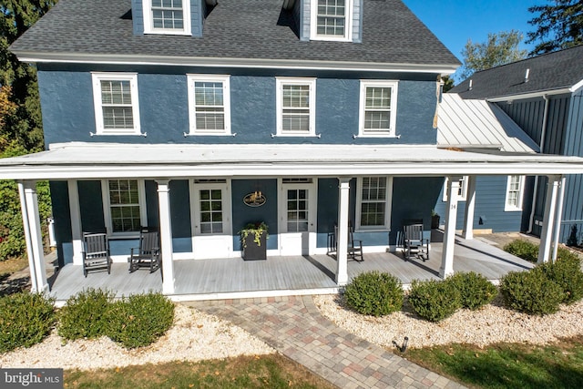 back of property featuring a patio area