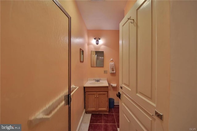 bathroom with vanity and tile patterned floors