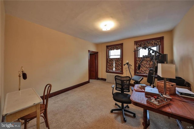 home office featuring light carpet and radiator heating unit