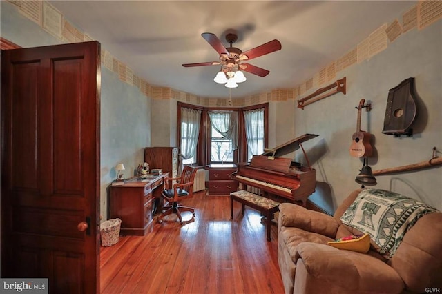 interior space featuring light wood-type flooring and ceiling fan