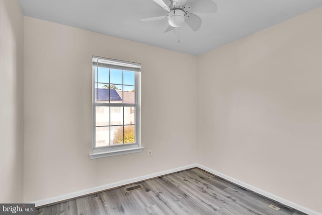 unfurnished room with light hardwood / wood-style floors and ceiling fan