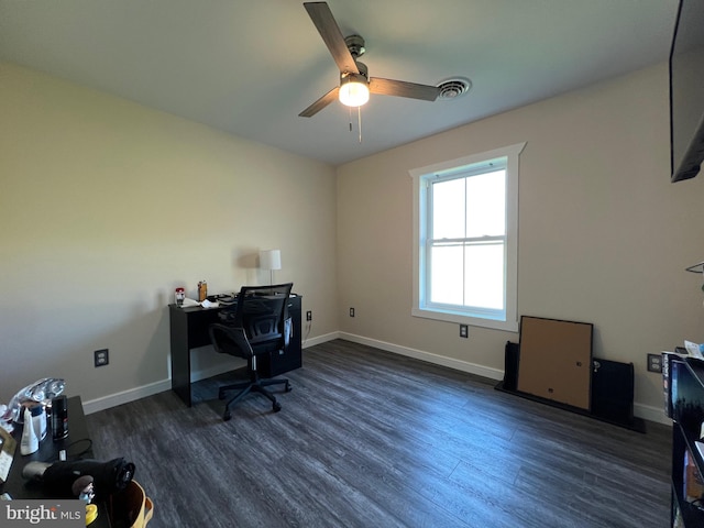 office with dark hardwood / wood-style flooring and ceiling fan