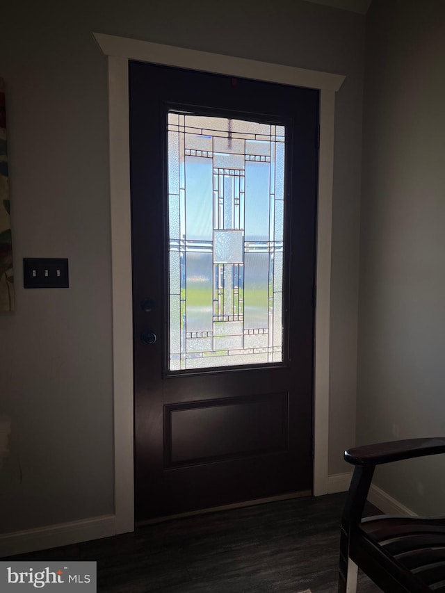 entryway with dark hardwood / wood-style floors