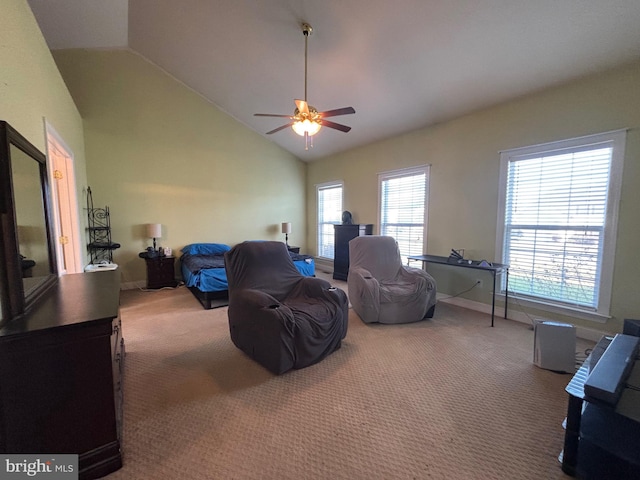 carpeted bedroom featuring ceiling fan, high vaulted ceiling, and multiple windows