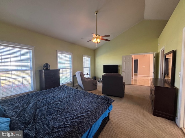 bedroom featuring ceiling fan, carpet, and high vaulted ceiling