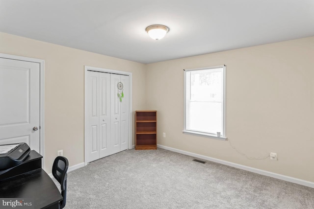 view of carpeted office space