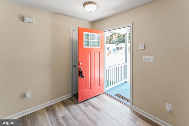 foyer with light hardwood / wood-style flooring