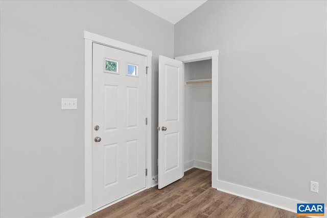 foyer featuring dark hardwood / wood-style floors